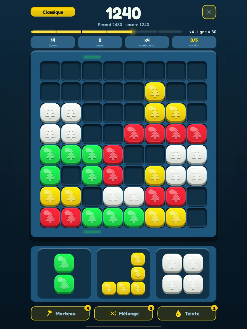 Block puzzle on iPad: a Stakko game with the Christmas theme, full-width board